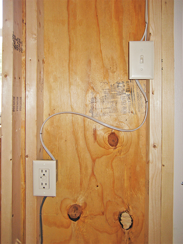 electric wires, outlet, and switch in a shed