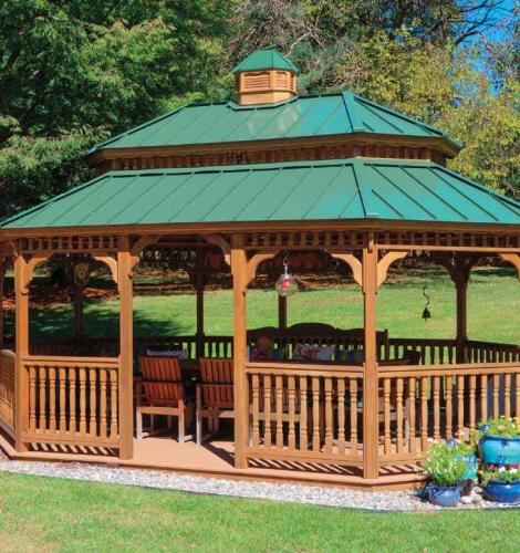 14x20 oval gazebo with open wood siding, a double roof with green metal roofing, and a cupola.