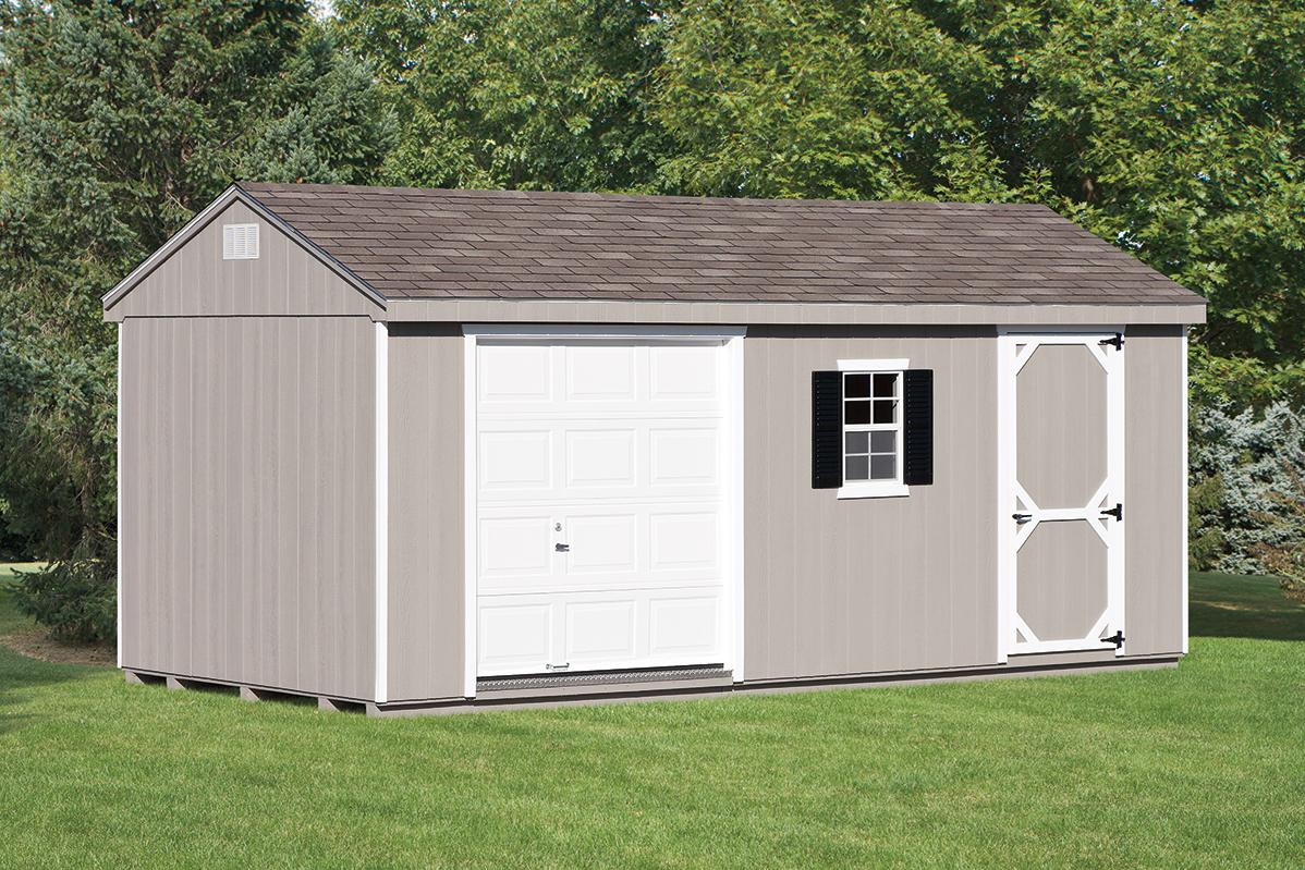 Cottage Garage with wood siding painted gray, white trim, a white garage door, a single-entry door, a white window with black shutters, a white gable vent, and a brown asphalt roof.